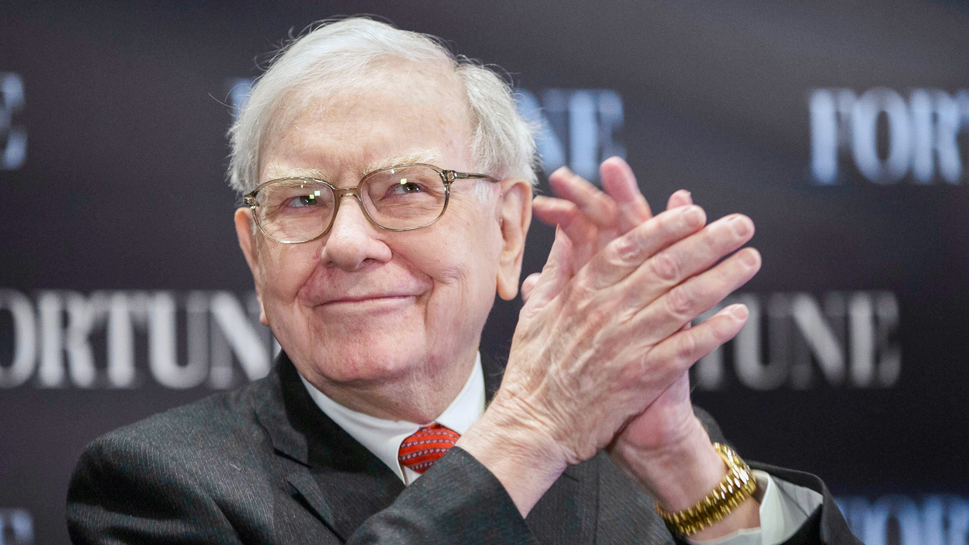 Warren-Buffett-claps-his-hands-during-interview-shutterstock_editorial_6209326b_huge.jpg