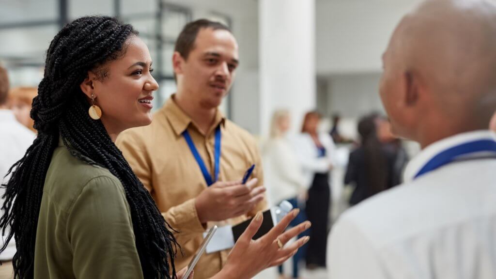 colleagues networking at work function event