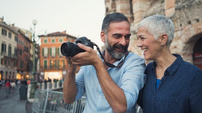 Mature couple as tourist in city Verona.