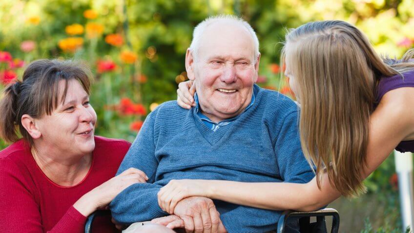elderly grandpa with his granddaughter