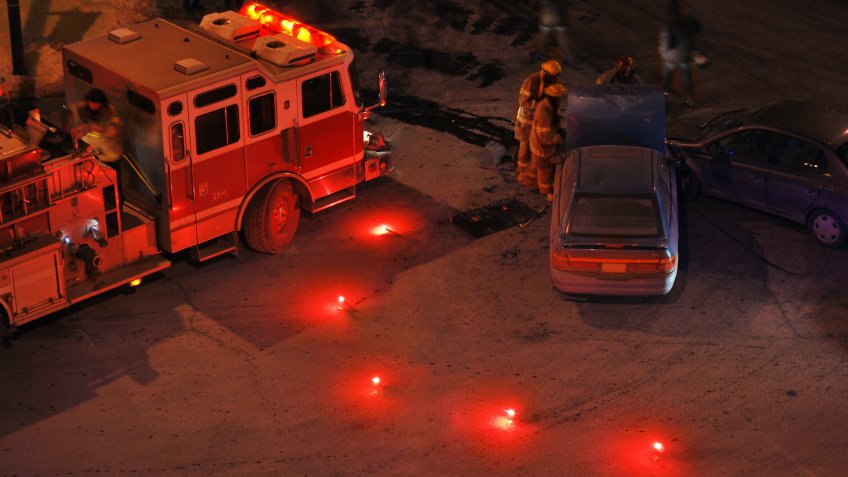 Fender bender and fire engine at night