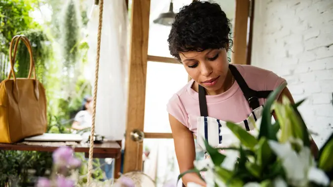 Business of flower shop with woman owner.