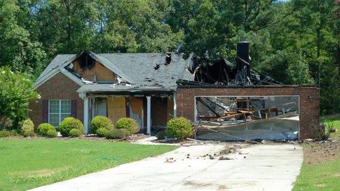 House damaged by fire caused be a lightning strike in rural Georgia, USA.