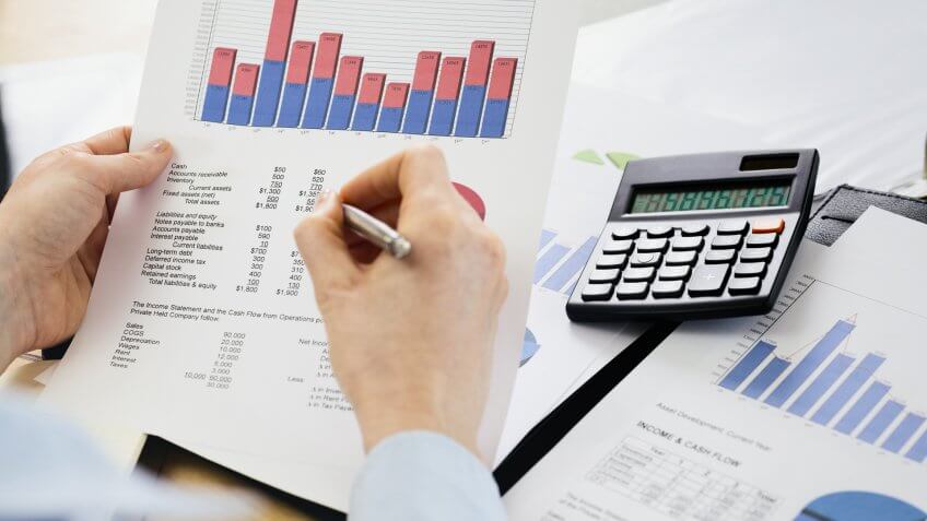 man calculating finances