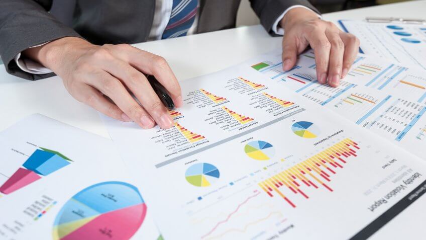 man reviewing financial papers
