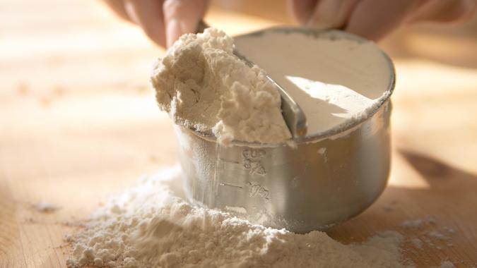 Baking - measuring flour.