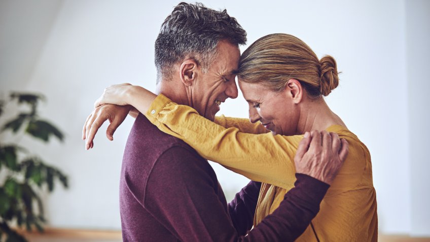 Cropped shot of an affectionate mature couple in their home.