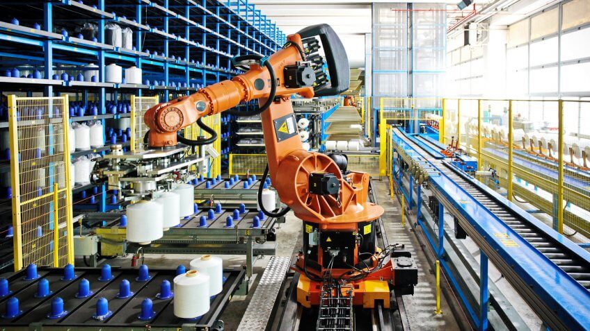 robotic arm in a warehouse facility