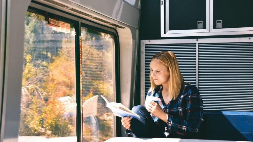 woman reading on Amtrak train