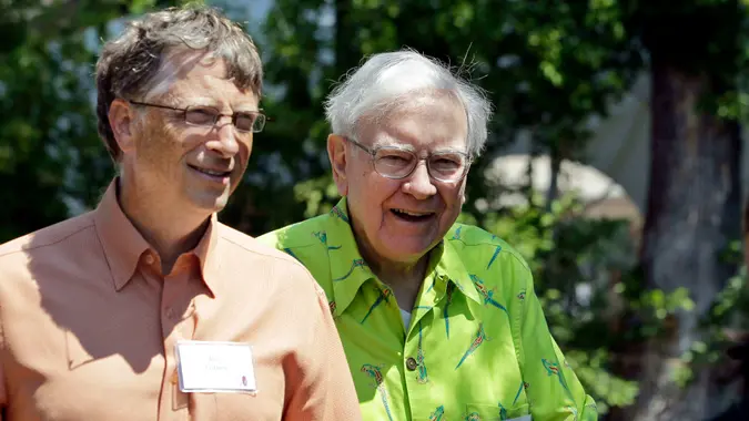 Bill Gates and Warren Buffet talking in Sun Valley Idaho