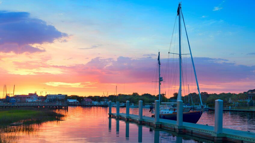 Sunrise Over A Docked Sailboat In Charleston South Carolina.