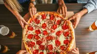 A Large Pizza Costs $18 at the Most Expensive Chain: How That Compares To 8 Other Chains