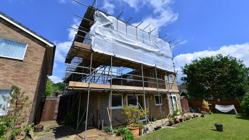 home with additional unit under construction