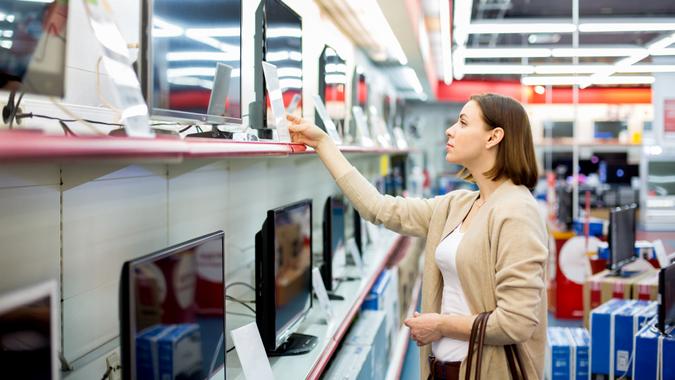 woman buys the TV.