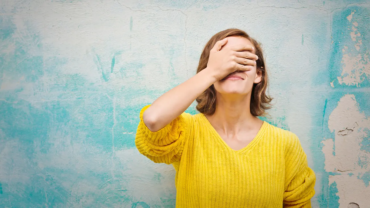 Young woman regretting a choice she has made.