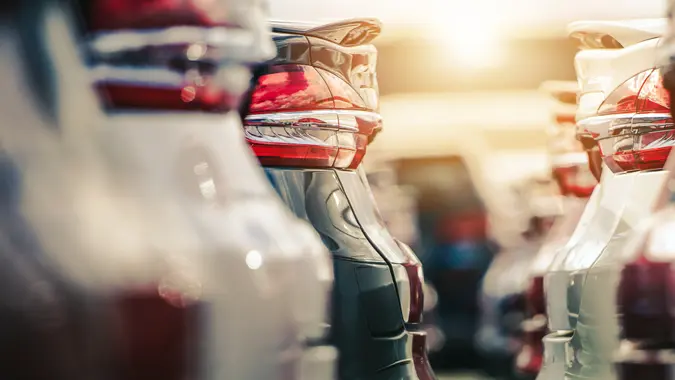 new car prices on car dealership lot with prices going up