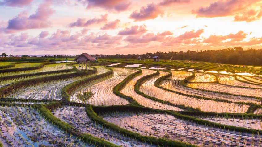 This is a horizontal, color photograph shot with a Nikon D800 on a scenic sunset near Tanah Lot, Bali Indonesia.