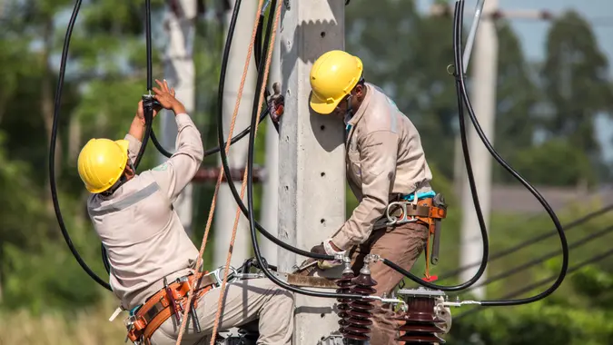 utility workers working on electricity