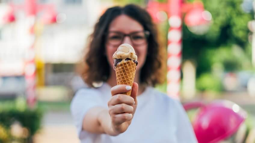 Woman eating ice cream.