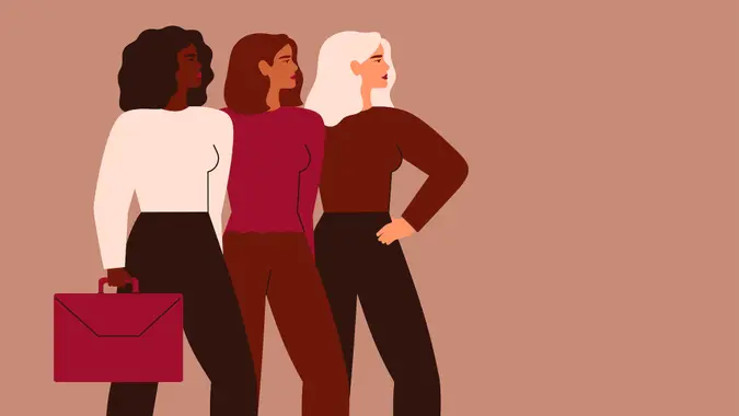 Confident businesswomen stand together.
