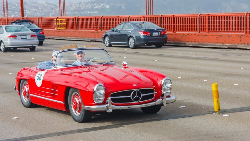 SAN FRANCISCO - APRIL 30: A 1958 Mercedes Benz 300SL Roadster is being driven on Golden Gate Bridge during the 2012 California Mille race in San Francisco on April 30, 2012.