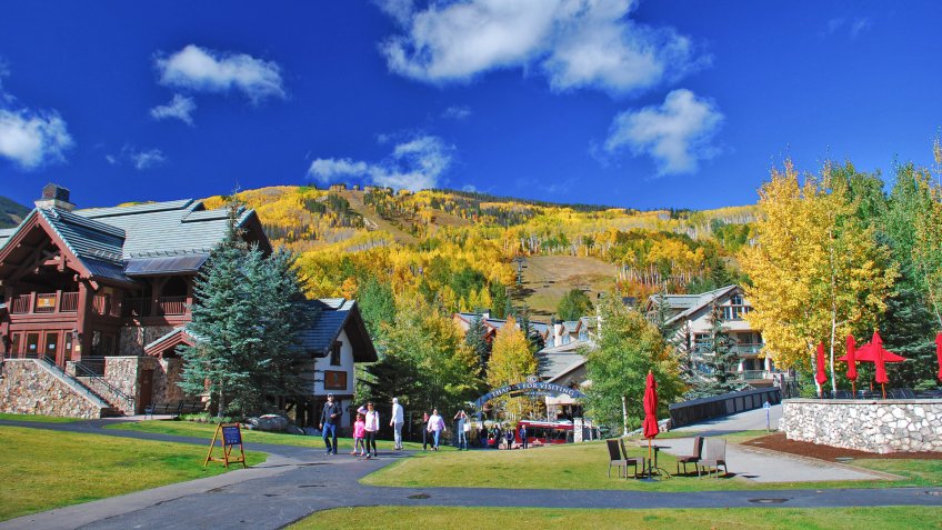 AVON, CO - SEPTEMBER 25, 2016: Families soak in the fall colors at Beaver Creek Resort in Colorado.
