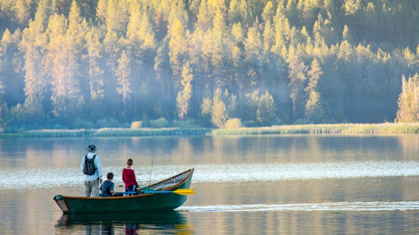 Dad and sons fishing on an Idaho lake - Image.