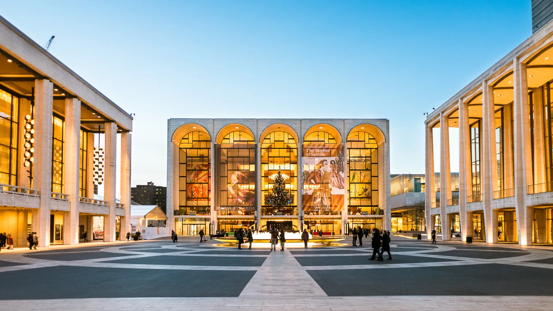 "New York, United States - December 6, 2012: People going to the opera The Barber of Seville at The Lincoln Center, one of the world's leading venue presenting superb artistic programming such as theate, concerts, dance, cinema and poetry.