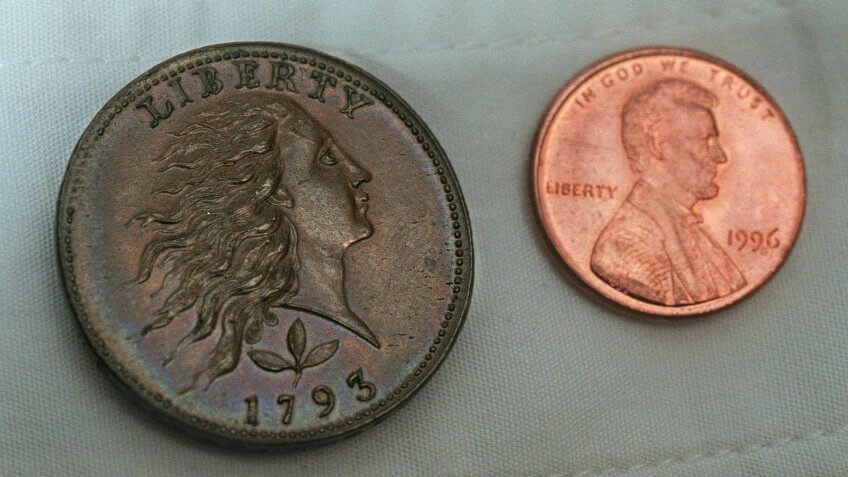 Original Flowing hair cent penny from 1793 with new US Penny