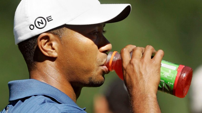 Tiger Woods drinks Gatorade and wears Nike clothes
