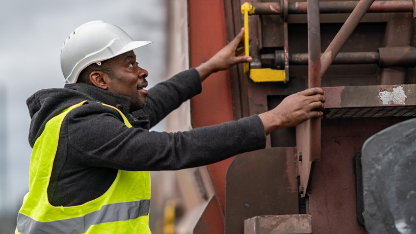Transportation Inspector checking train