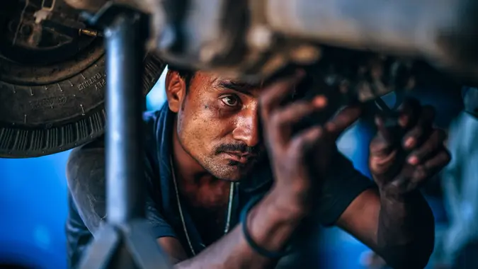 auto mechanic repairing a car