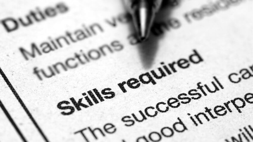 close up of job requirements on paper