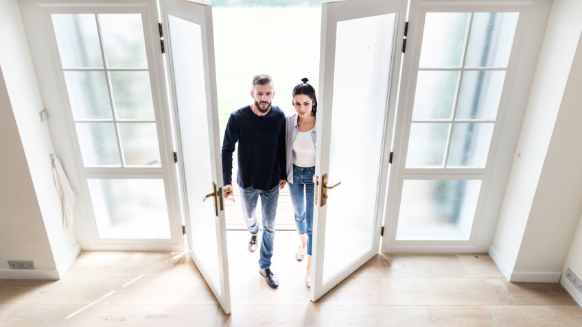Couple move to new house.
