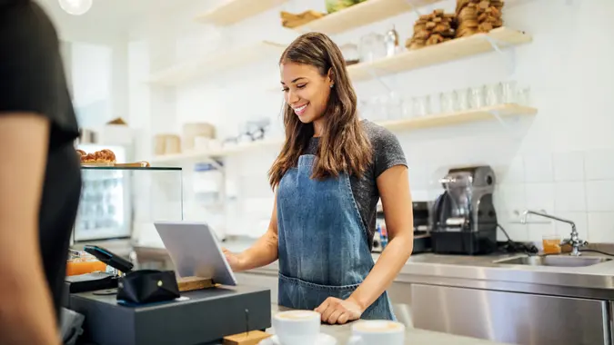 female cashier taking customer order