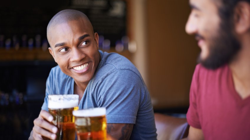 A cropped shot of young friends having drinks in a barhttp://195.
