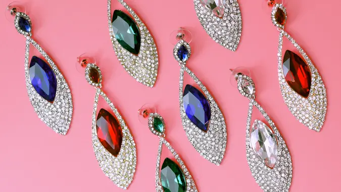 jewelry earrings on pink background