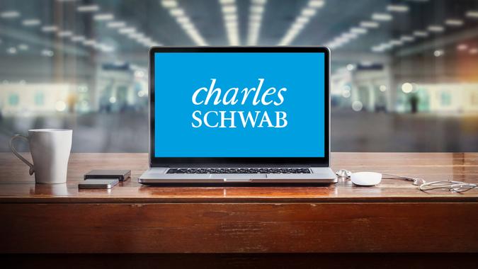 laptop screen with Charles Schwab Bank login website