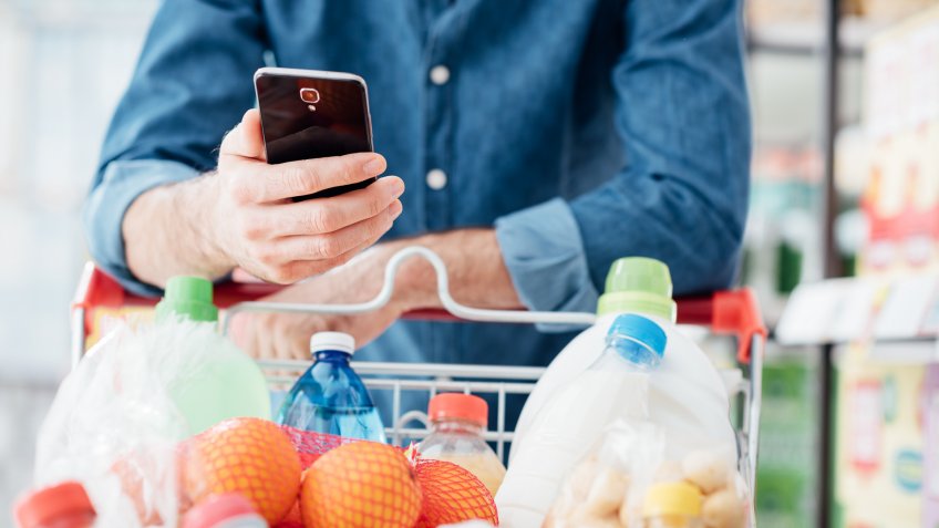 man shopping in grocery store