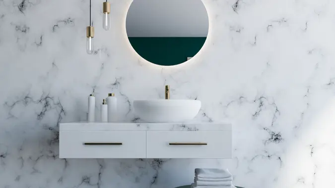 modern remodeled bathroom with marble wall