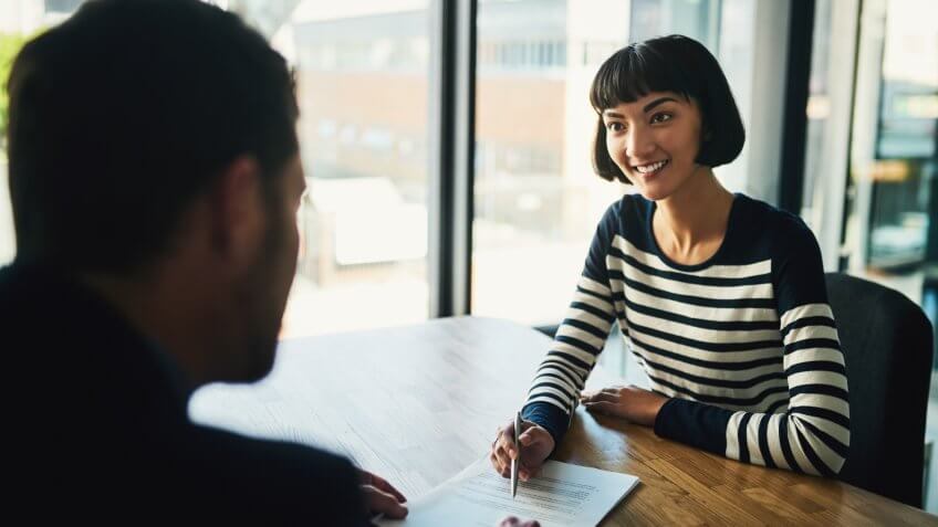 two people in an interview room