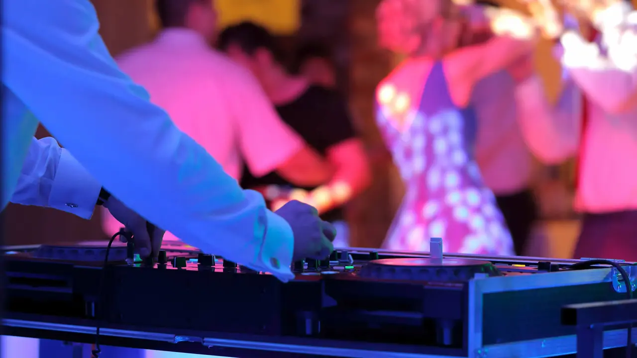 wedding dj performing for party