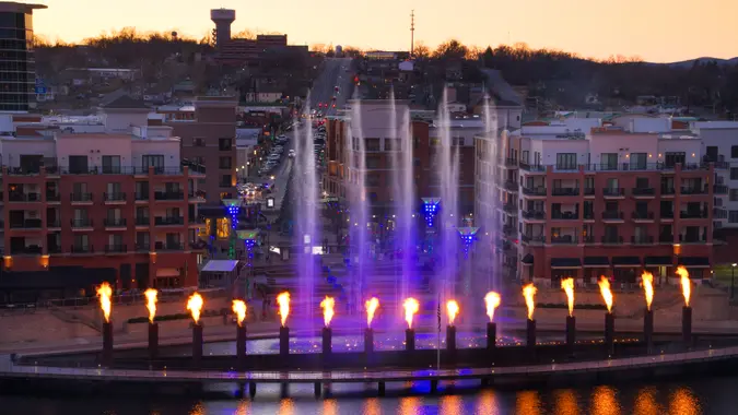 Skyline view of Branson, Missouri with the display showing at the landing waterfront park area.