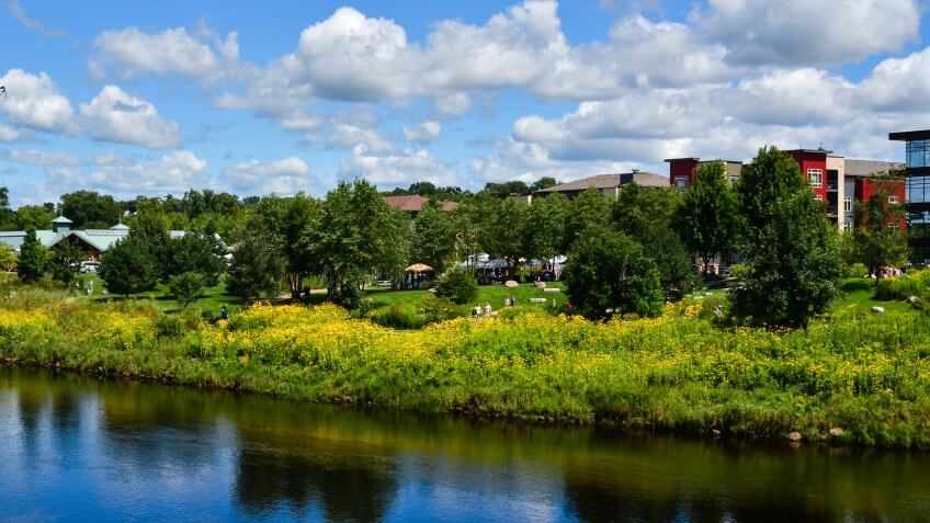 View of the farmers market and Phoenix Park along the Chippewa River in Eau Claire, Wisconsin - Image.