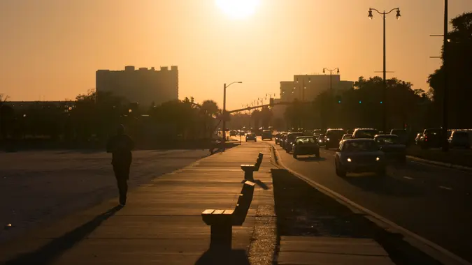 Gulfport, MS, USA – February 7, 2015: Pedestrian and automotive traffic in Downtown Gulfport on Highway 90 next to the beach.