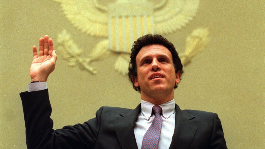 Michael Milken is sworn in before a hearing of the House oversight and investment subcommittee on Capitol Hill in Washington, D.C.