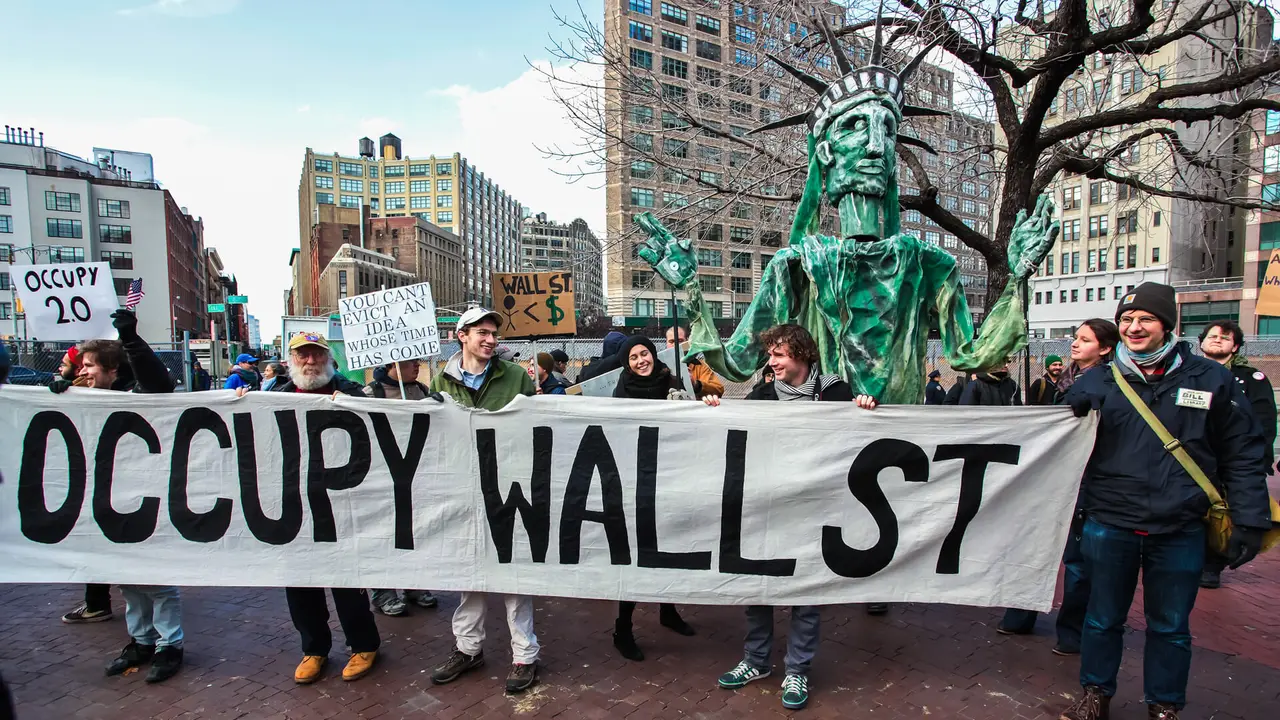 NEW YORK CITY, USA - DECEMBER 17 2011: Occupy Wall Street, protesting financial malfeasance, marked its 90 day anniversary with marches in Manhattan.