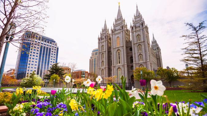 Salt Lake Temple with beautiful flowers during day time, USA.