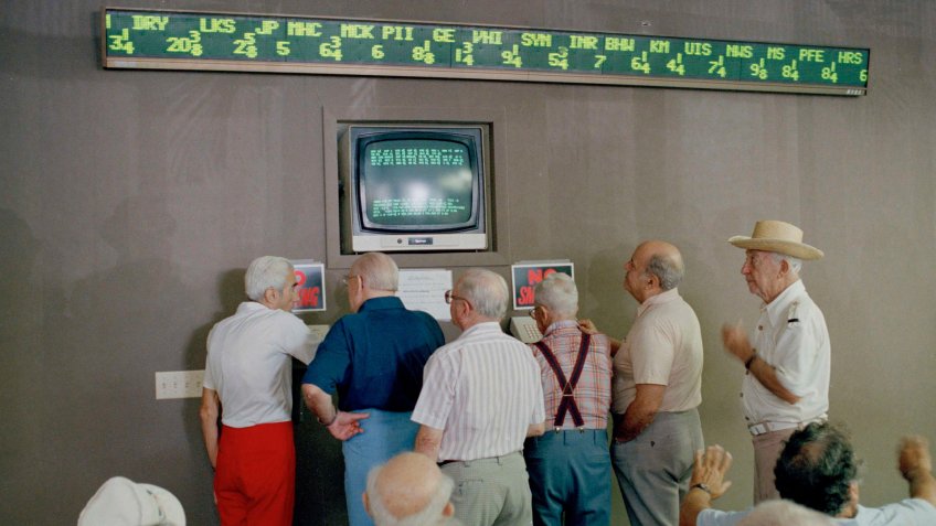 Senior citizens keep an eye on stock market prices after market collapse in 1987