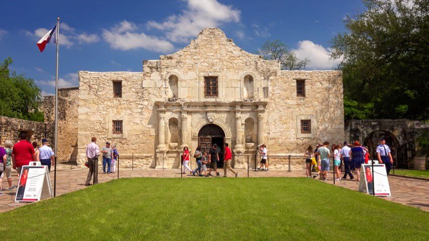 San Antonio, Texas, USA - October 10, 2016: Exterior view of the historic Alamo in San Antonio, Texas with tourists.